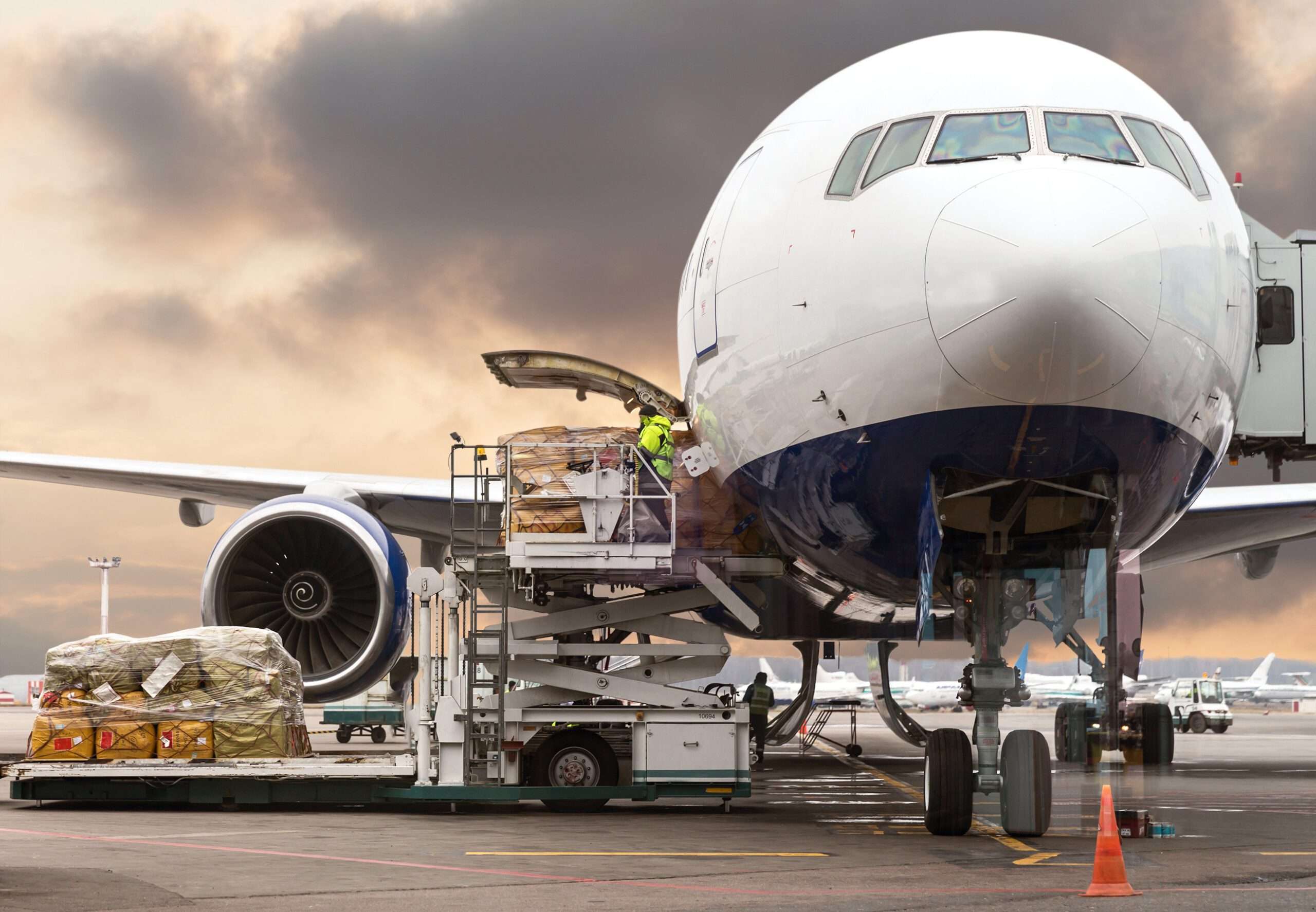 loading cargo freight on trucks being transported to aircrafts