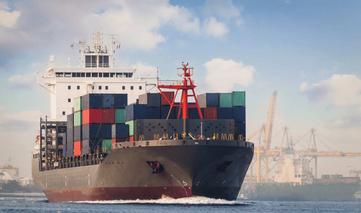 Container-Ship-at-Port-Highlighting-Global-Freight-Strategies freight on trucks being transported to aircrafts